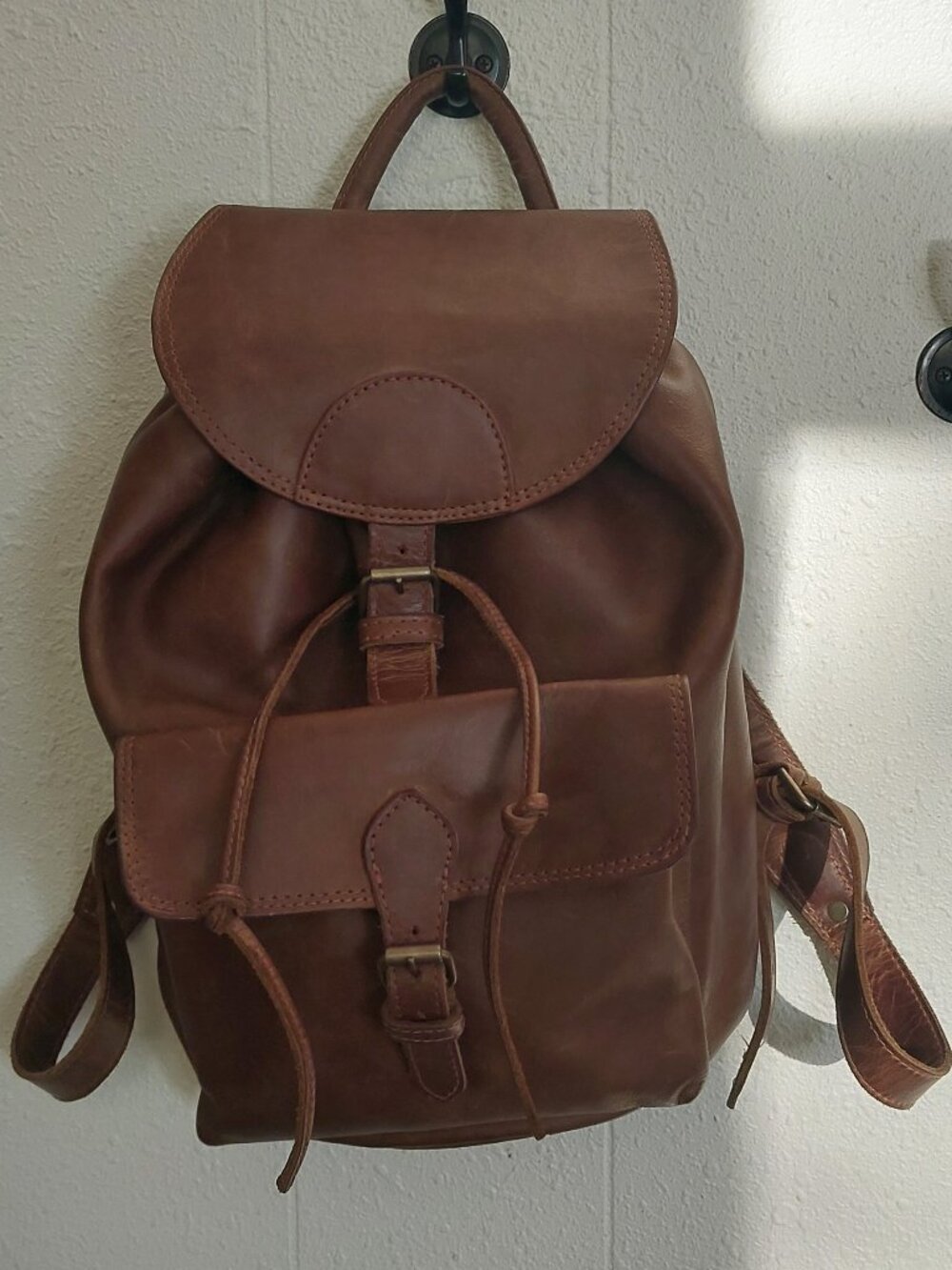 Full grain brown leather backpack
